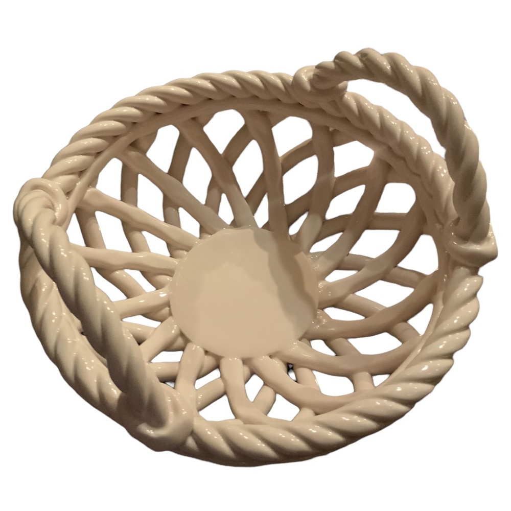 Pink round ceramic bread basket with handles
